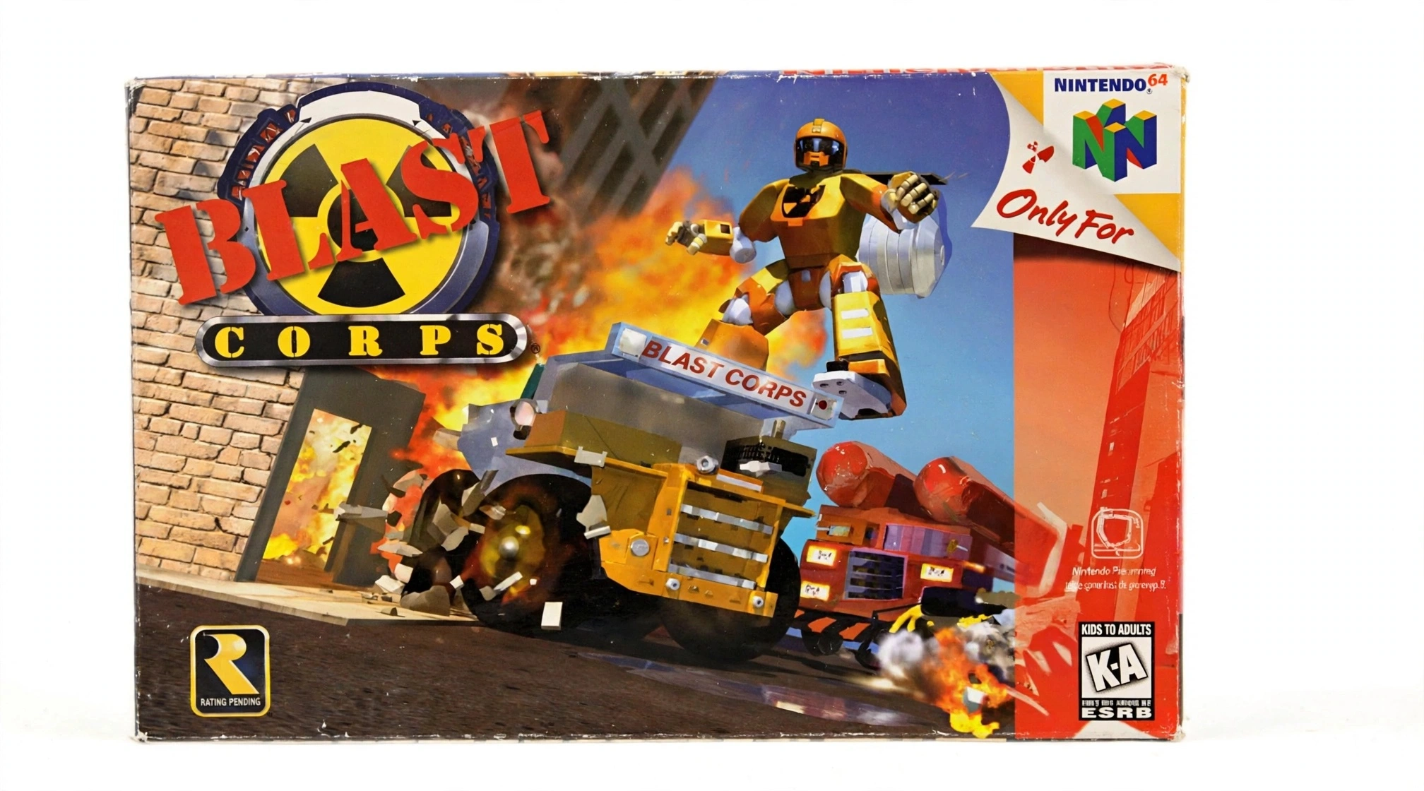 Heavy demolition vehicles destroy buildings and other obstacles to clear a dangerous transport route in Blast Corps. The Nintendo 64 action game features vehicle-based destruction, timed missions, and environmental puzzles.